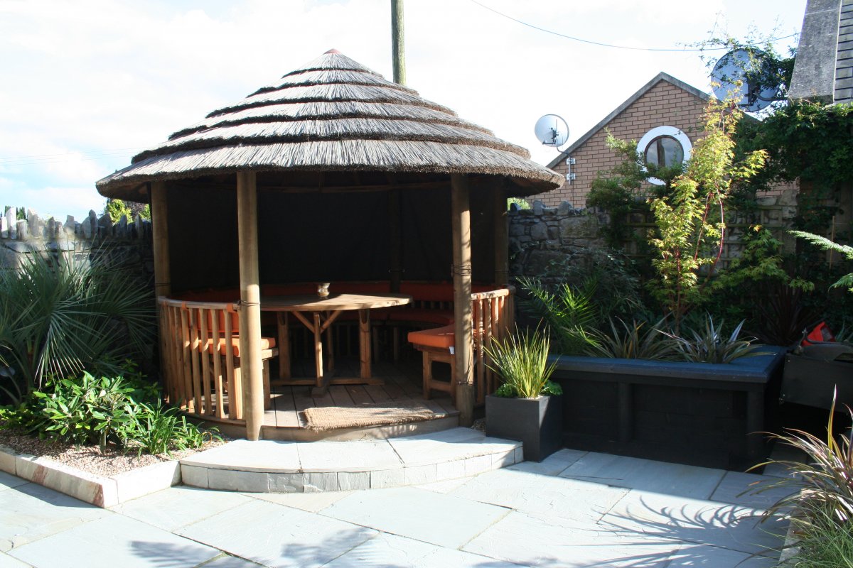 Highfield House - courtyard with breeze house for shelter